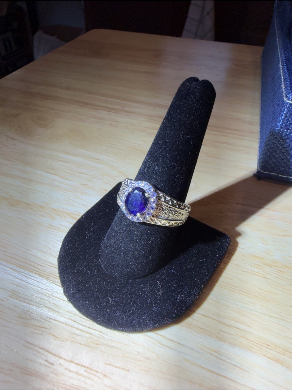 Men’s Blue Sapphire Ring with White Topaz Accents.
